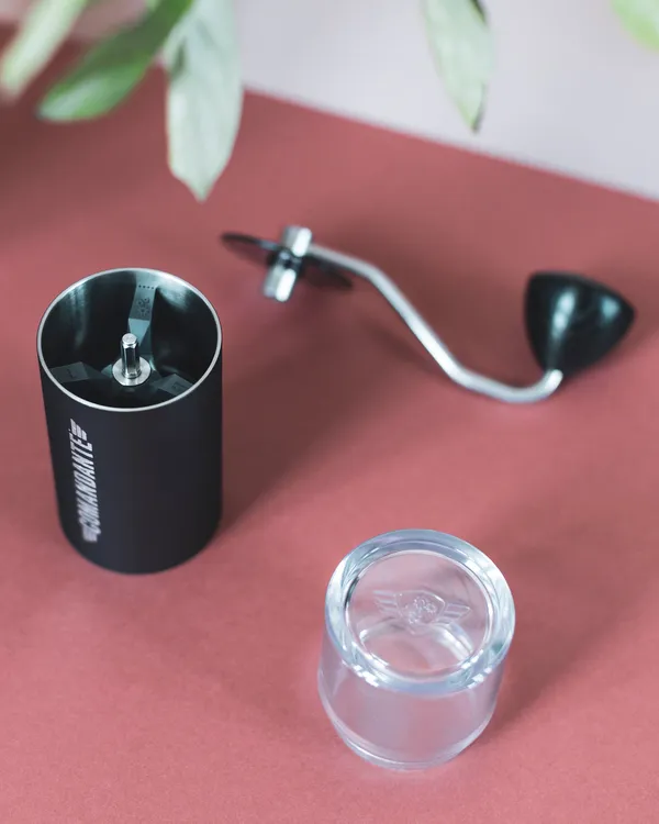 The black C40 taken apart: body, crank and bean jar