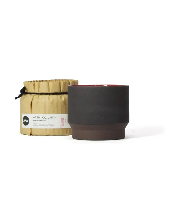 The 100 ml Ember cup with its paper wrapping
