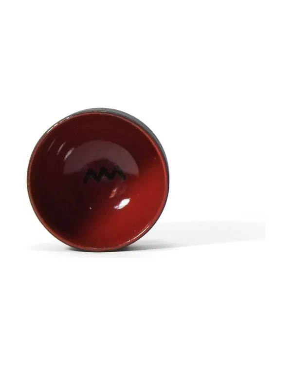 Inside the 60 ml Ember cup, glazed red