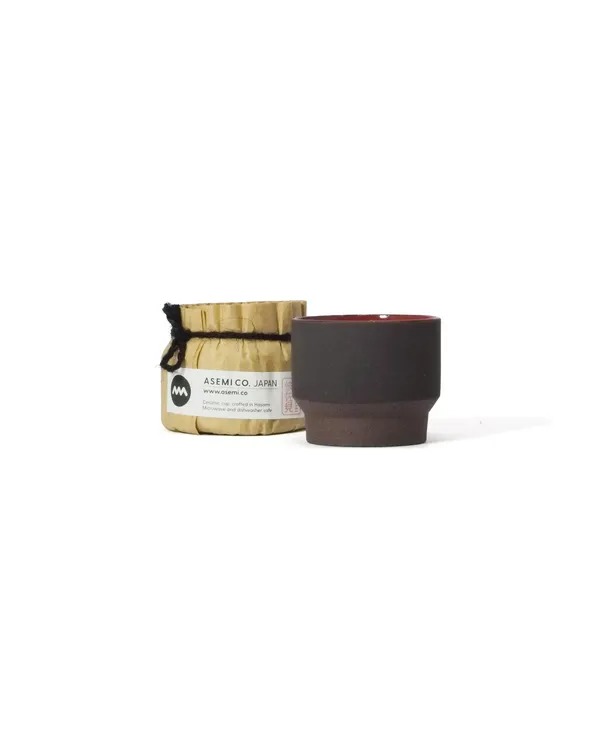 The 60 ml Ember cup with its paper wrapping