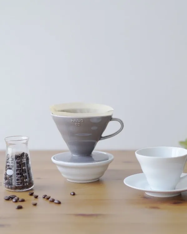 Grey and white V60 drippers on a table